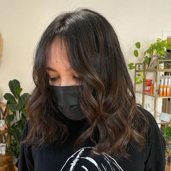 Rich Brown Tones - a woman wearing black mask and shirt.