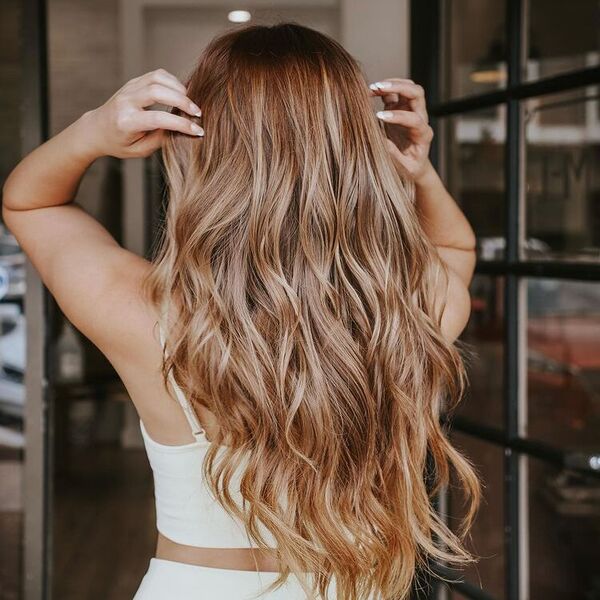 Sexy Red Head Blonde Balayage - a woman wearing a white spaghetti strap crop top