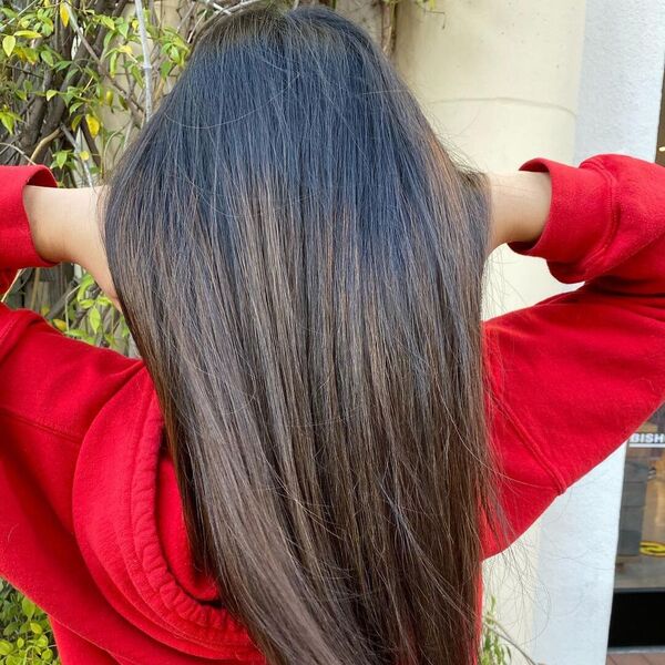 Shag Straight Dark Balayage Hair - a woman wearing red hooded jacket.