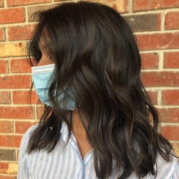 Shaggy Short Dark Coffee Balayage on Dark Hair - a woman wearing mask and striped top.