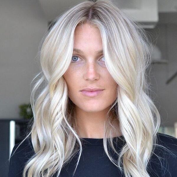 Soft White Blonde Hair - a woman wearing a black shirt