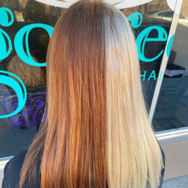 Spicy Two Toned Blonde - a woman wearing a black shirt is in outside part of the salon