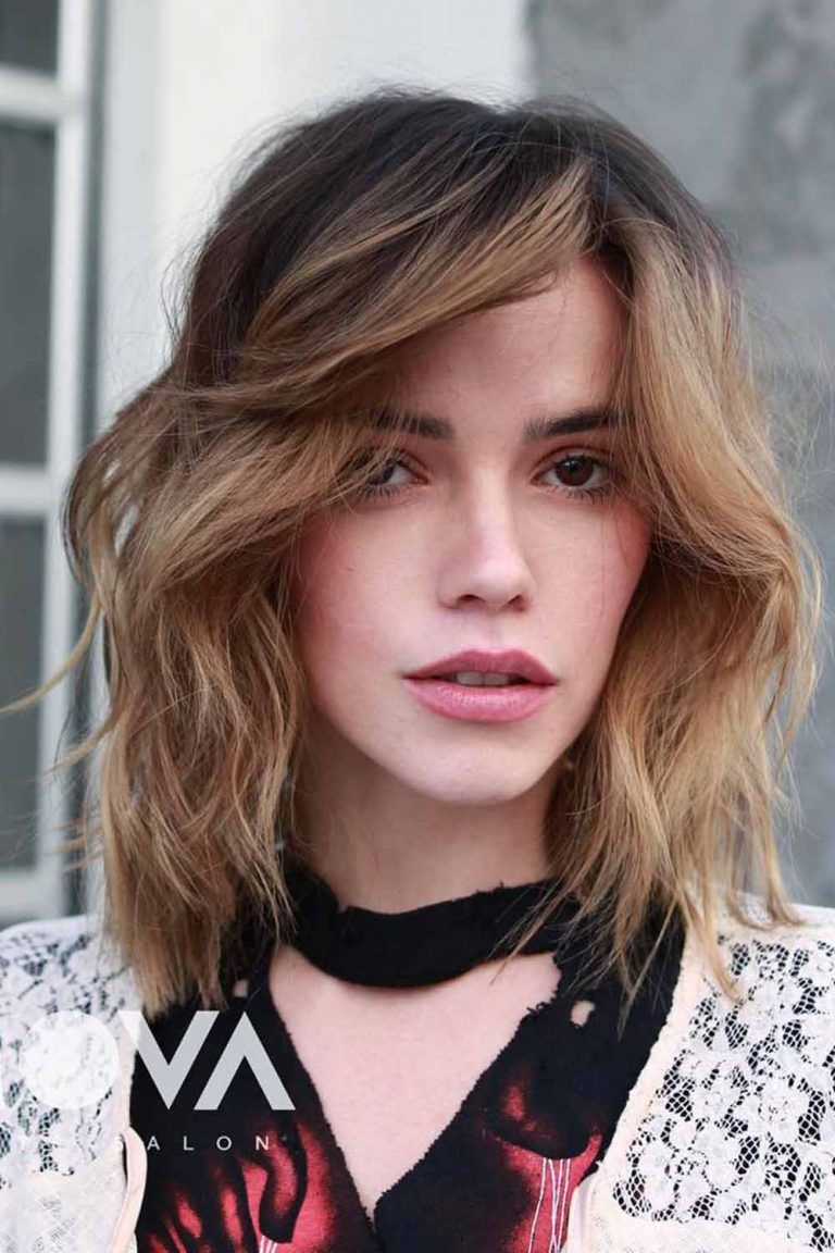 trendy-medium-length-hairstyles-for-thick-hair-sandy-side-part-wavy-768x1152