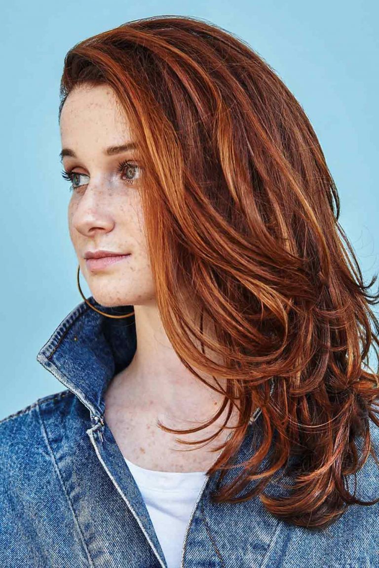 trendy-medium-length-hairstyles-for-thick-hair-side-swept-red-highlights-layers-768x1152