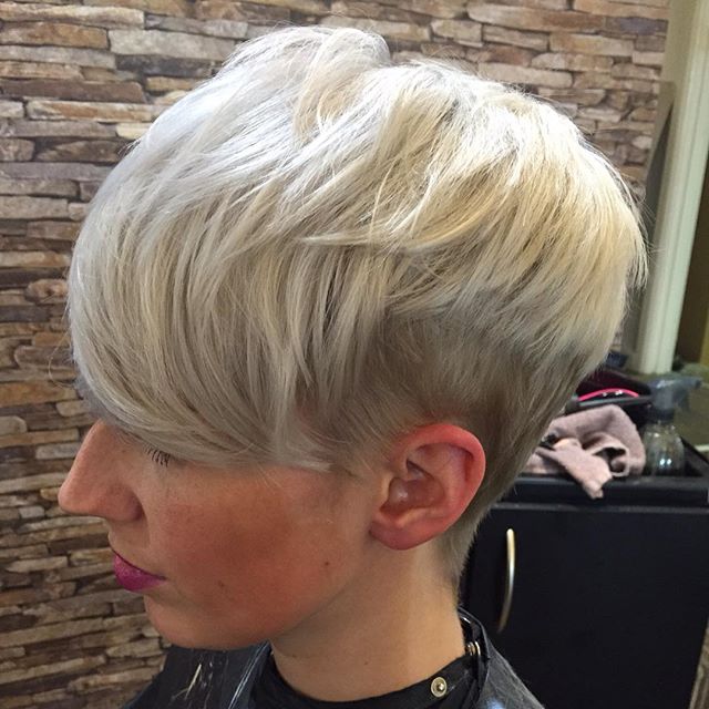 Platinum blonde long pixie with textured layers