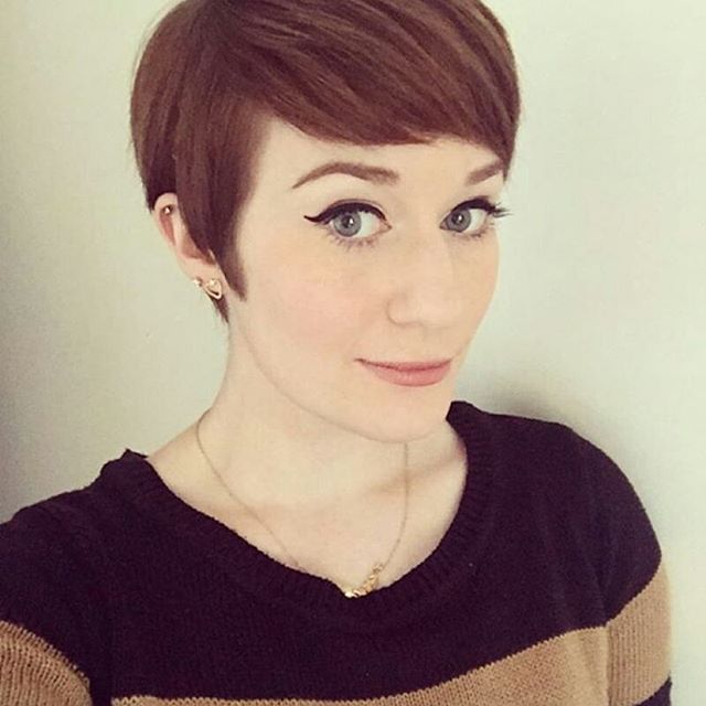 Smooth ash brown pixie with highlights