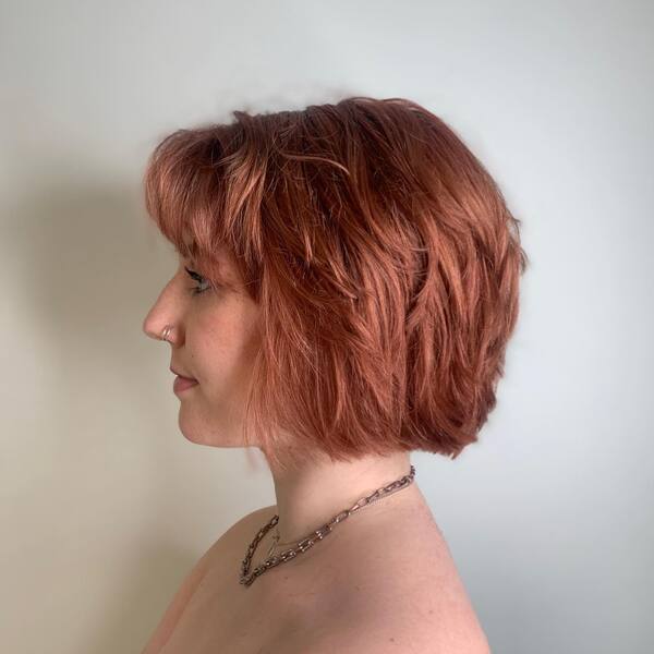 A woman wearing a necklace