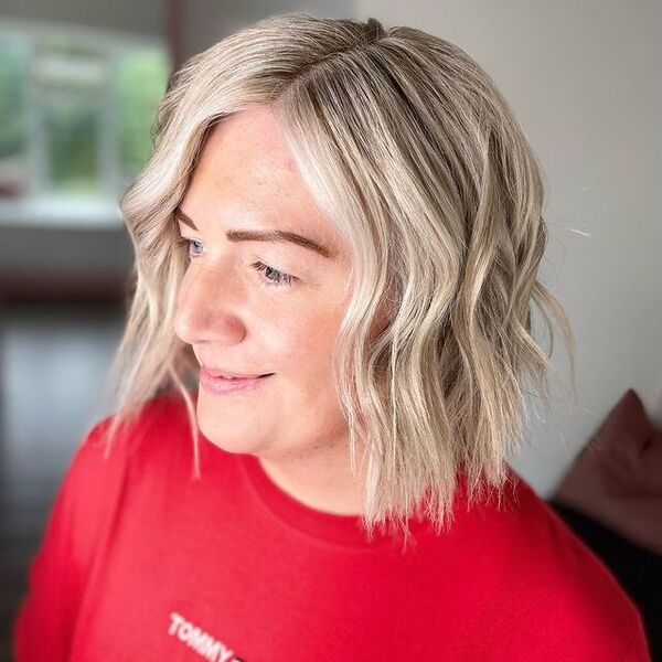 A woman wearing a red shirt