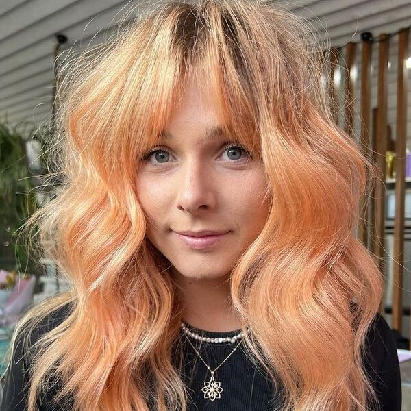 Apricot Peachy Hair - a woman wearing a necklace