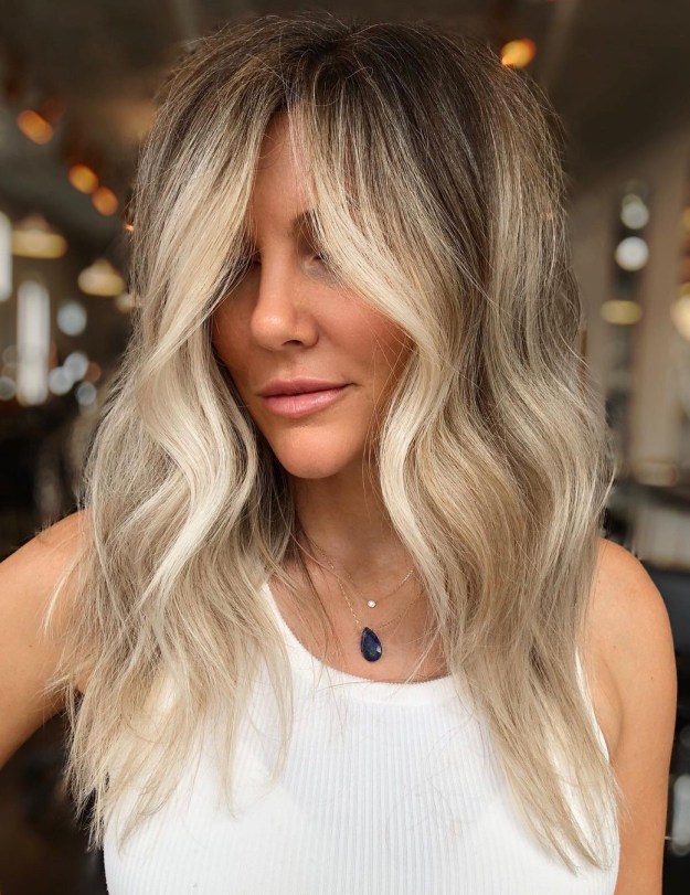 Ash Blonde Balayage with Bright Face Framing Highlights