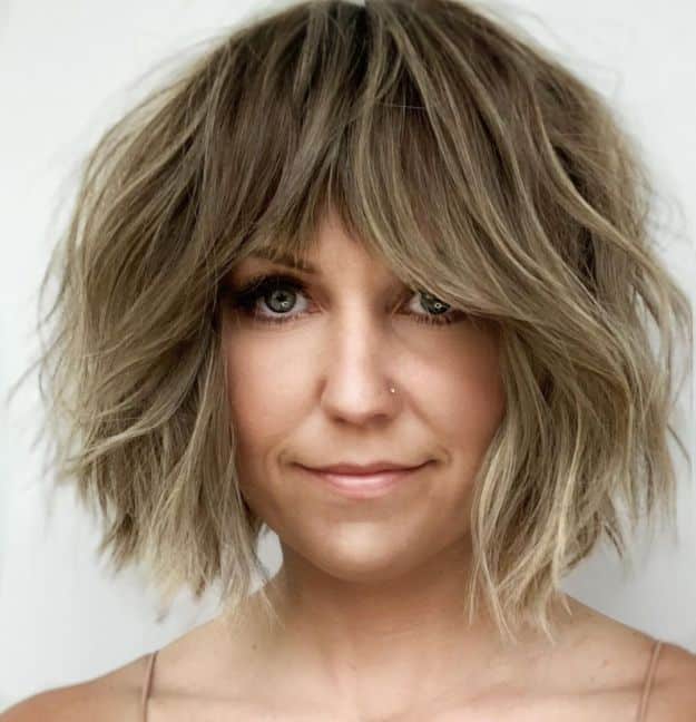 Ash Blonde Shaggy Cut for Thick Hair