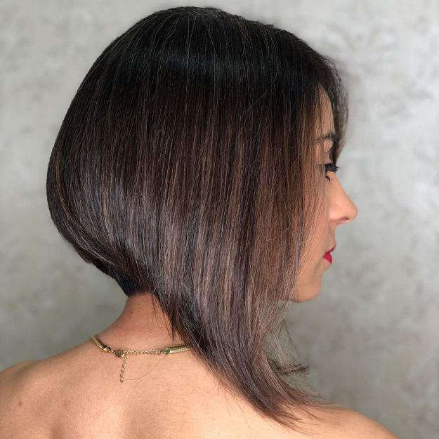 Asymmetrical Bob with Long Front Layers and Nape Taper Fade