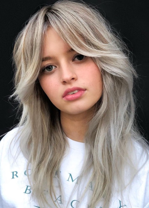 Blonde Hairstyle with Long Curtain Bangs