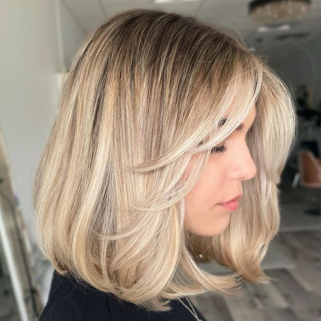 Blonde Shoulder Length Bob with Dark Roots and Front Layers