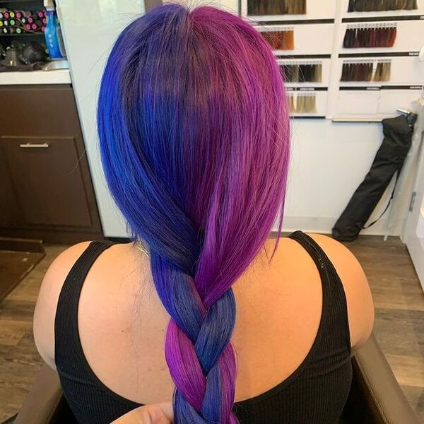 blue and purple hairstyle - a woman wearing a black sleeveless top