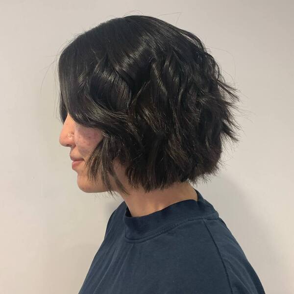 Choppy bob - a woman wearing a black longsleeve