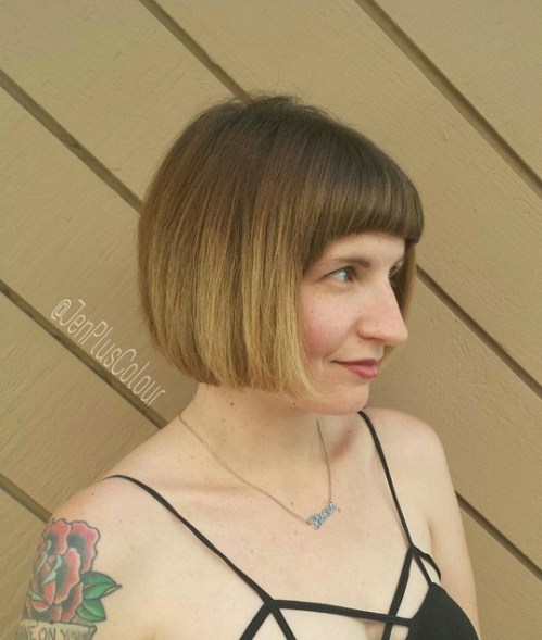 classic cute short blunt bob hairstyle with blunt bangs for thick hair