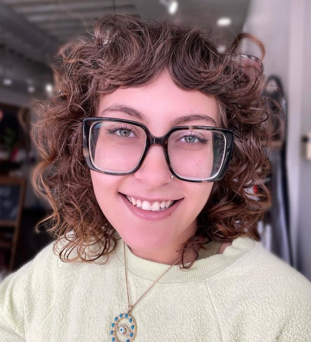 Curly Hairstyle with Baby Curtain Bangs
