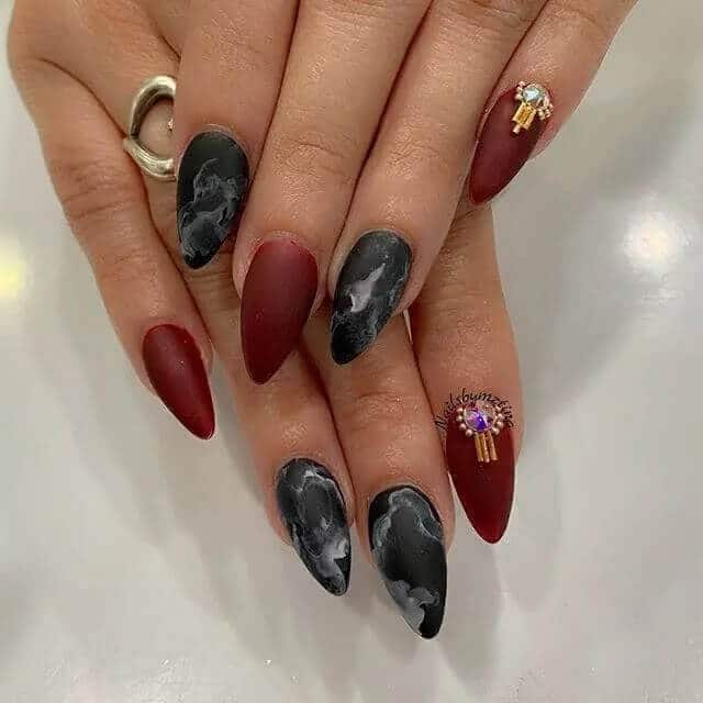 Daring Black Marble And Burgundy Nails