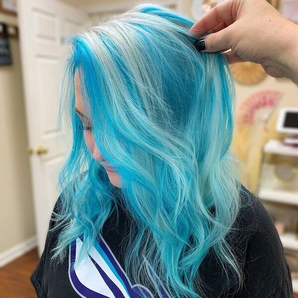 Dark and Light Blue Combo Hair - a woman wearing a black printed shirt