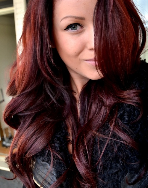 dark brown burgundy hair with highlights