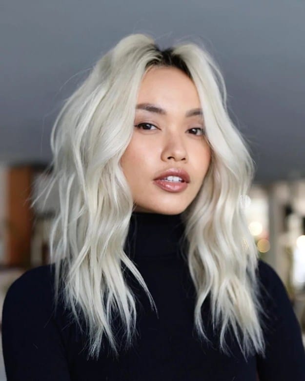 Layered Blonde Hair with Dark Roots