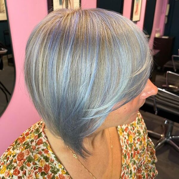 Light Blue Highlights on Gray Hair - a woman wearing a floral blouse