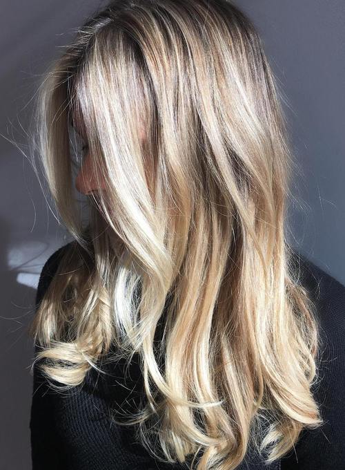 long disheveled blonde hairstyle