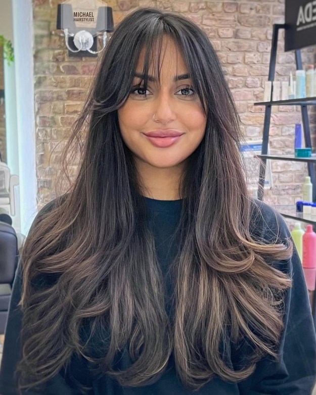 Long Haircut with Wispy Bangs for Round Faces