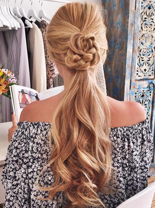 long ponytail hairstyle with a braided detail