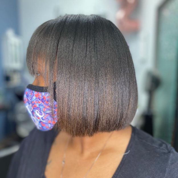 Medium Bob Haircut with Bangs for Black Hair