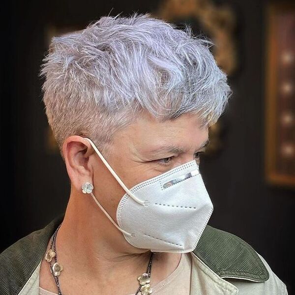 Natural Silver Gray Pixie - a woman wearing white mask