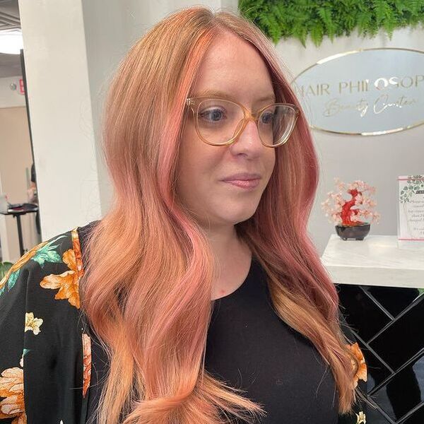 Peach Blonde Bombshell - a woman wearing a eyeglasses