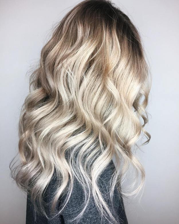 Platinum Blonde Balayage With Root Fade