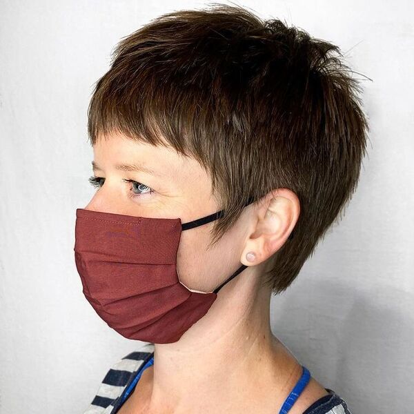 Razored Edgy Pixie - a woman wearing maroon mask