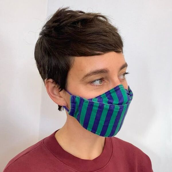 Shag Edgy Quiff Pixie - a woman wearing stripe mask