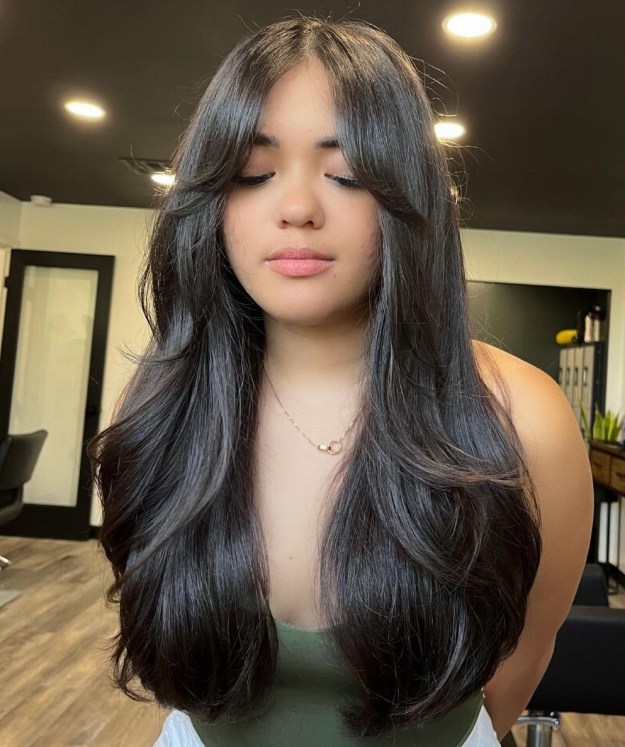 Shiny Long Hair with Face Framing Bangs for Round Faces