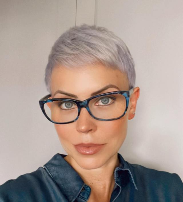 short blonde pixie cut with glasses