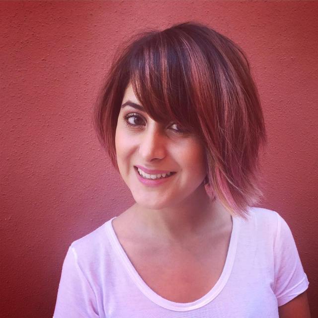 short red hairstyle with bangs