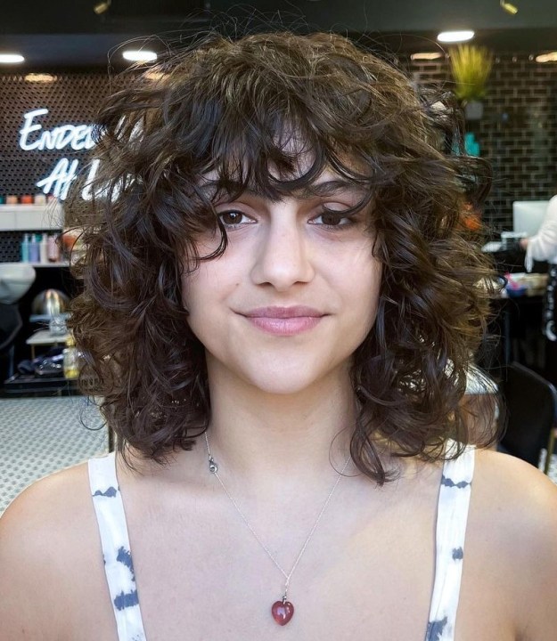Shoulder Length Curly Bob with Bangs