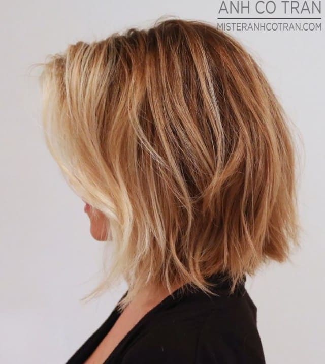 Side view of soft wavy bob cut