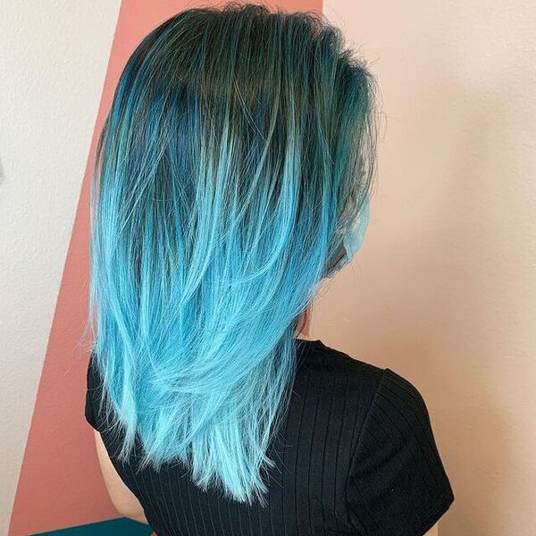 Teal Green and Light Blue Hair - a woman wearing a black shirt