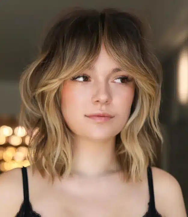 Curtain Bangs on Shoulder-Length Shag Cut