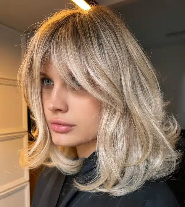 Thick Hair Style with a Layered Blonde Haircut