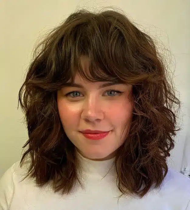 Voluminous Layered Cut with Bangs