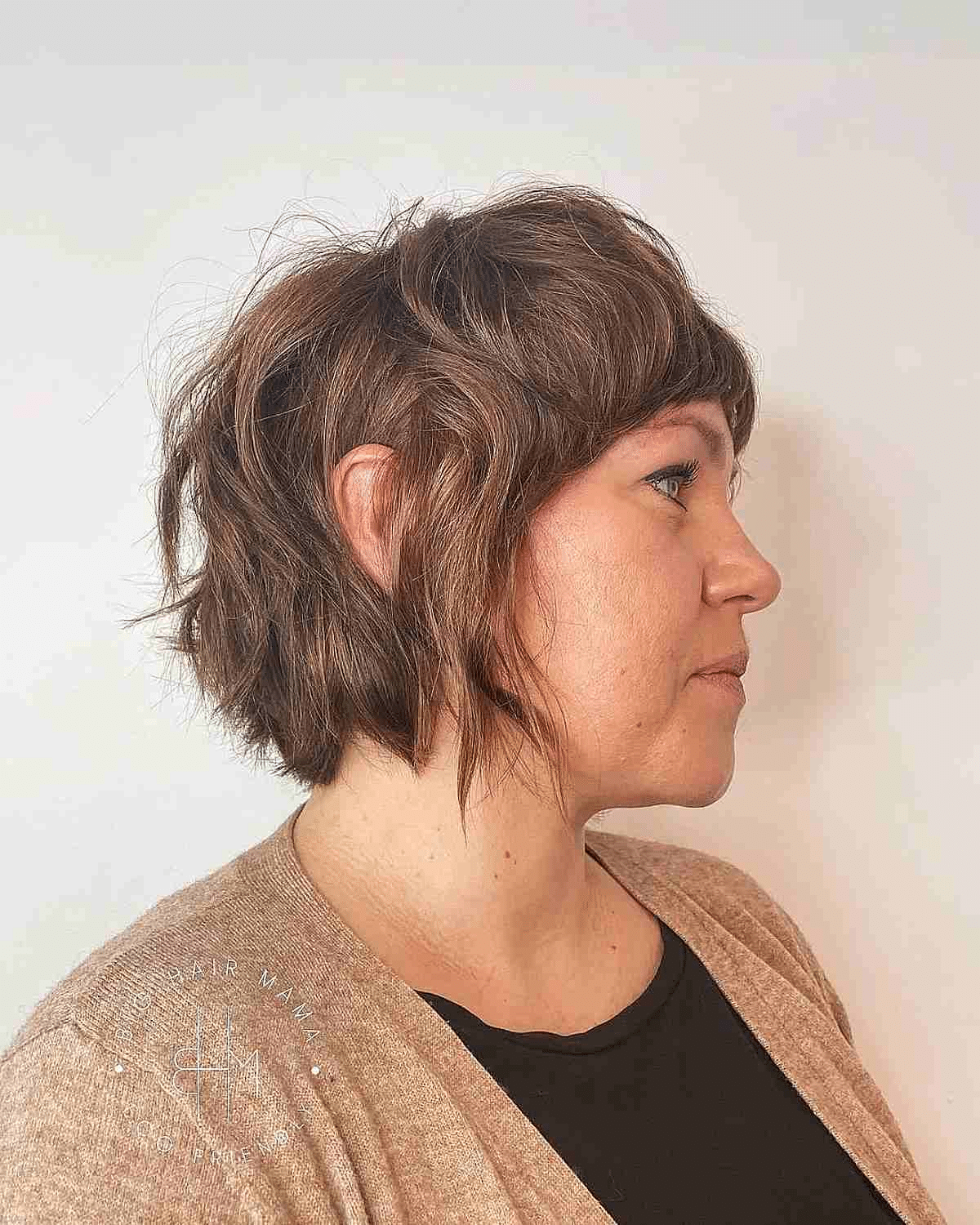 Bangs and Short Ruffled Shag Mullet