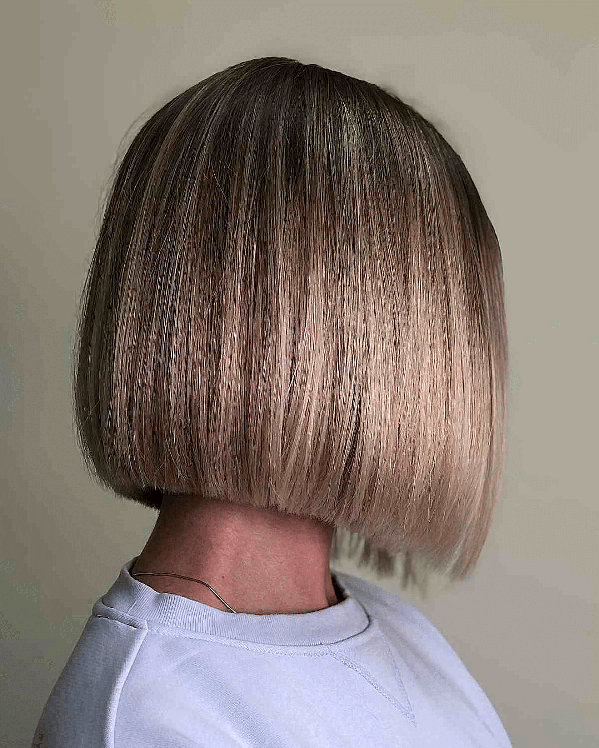 Chin-Length Blunt Bob on Dark-Rooted Blonde Balayage