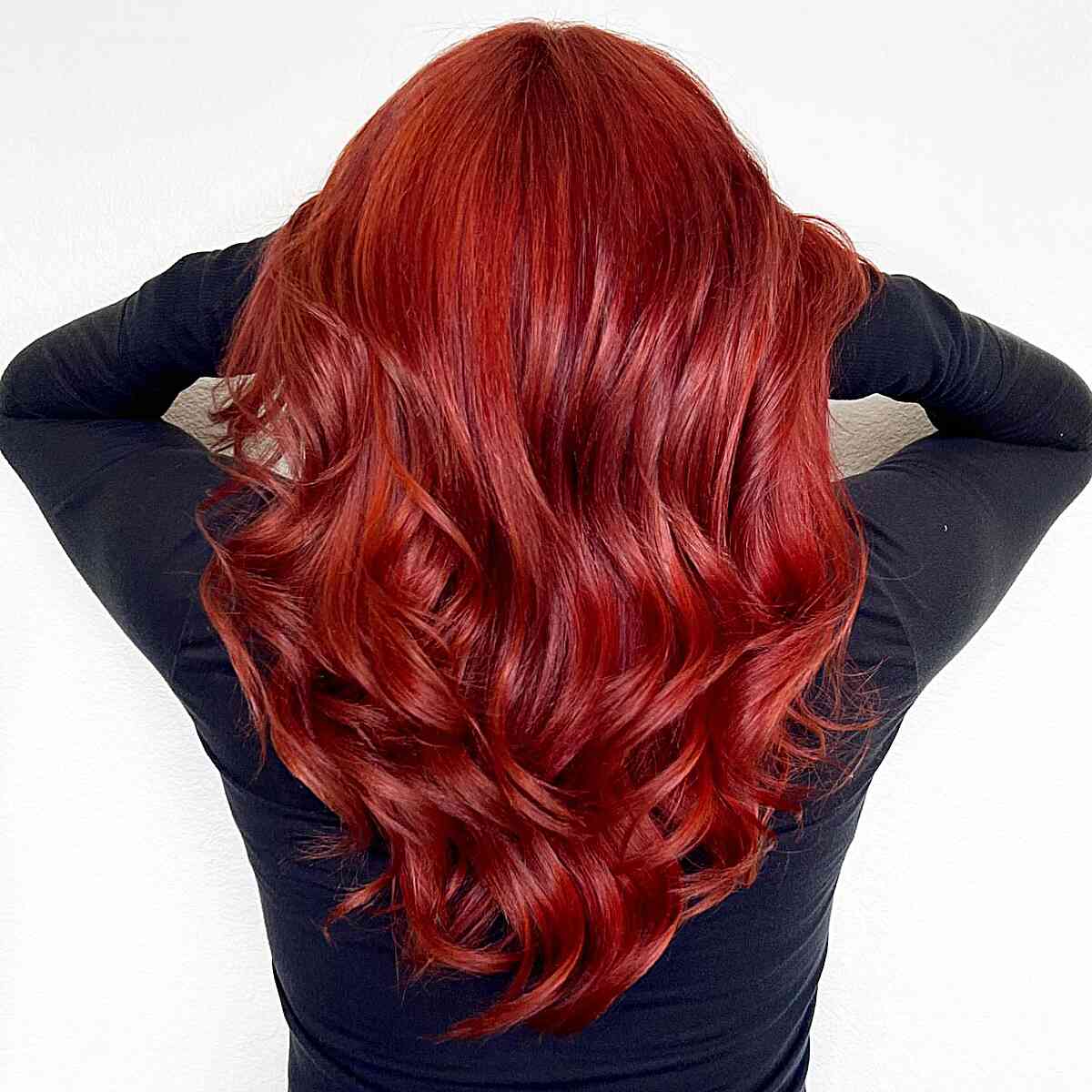 Hot Tamale with A Bright Red Color on Wavy Hair