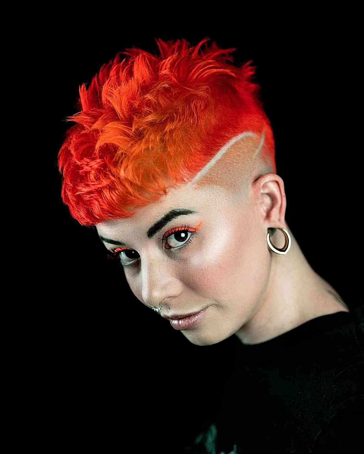 Bright Neon Red Pixie Cut with a Shaved Line and Textured Top