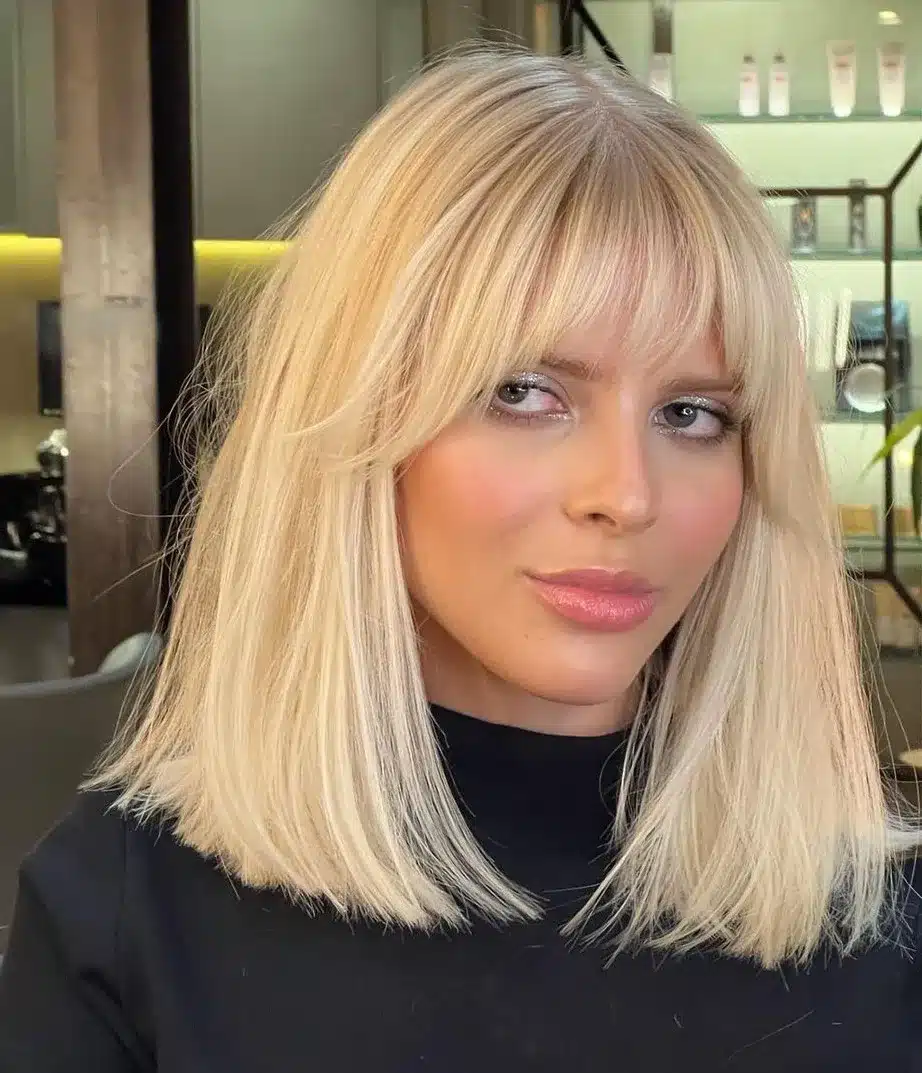 11-platinum-blonde-collarbone-length-cut-with-layered-bangs